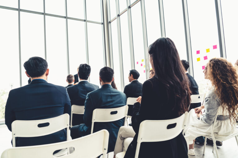 Sales team attending a structured training session, highlighting how capability is often treated as a one-off event